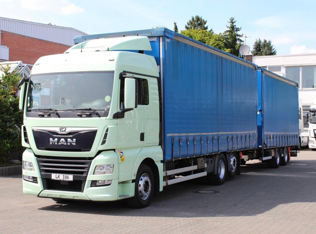 MAN TGX 26.460 Retarder Jumbo-Zug 120M3 Durchlade - Tent veoauto: pilt 1 MAN TGX 26.460 Retarder Jumbo-Zug 120M3 Durchlade - Tent veoauto: pilt 1