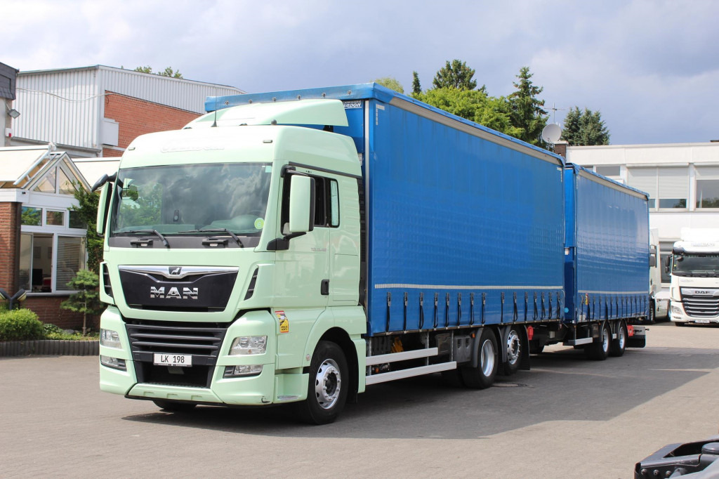 MAN TGX 26.460 Retarder Jumbo-Zug 120M3 Durchlade - Tent veoauto: pilt 1 MAN TGX 26.460 Retarder Jumbo-Zug 120M3 Durchlade - Tent veoauto: pilt 1