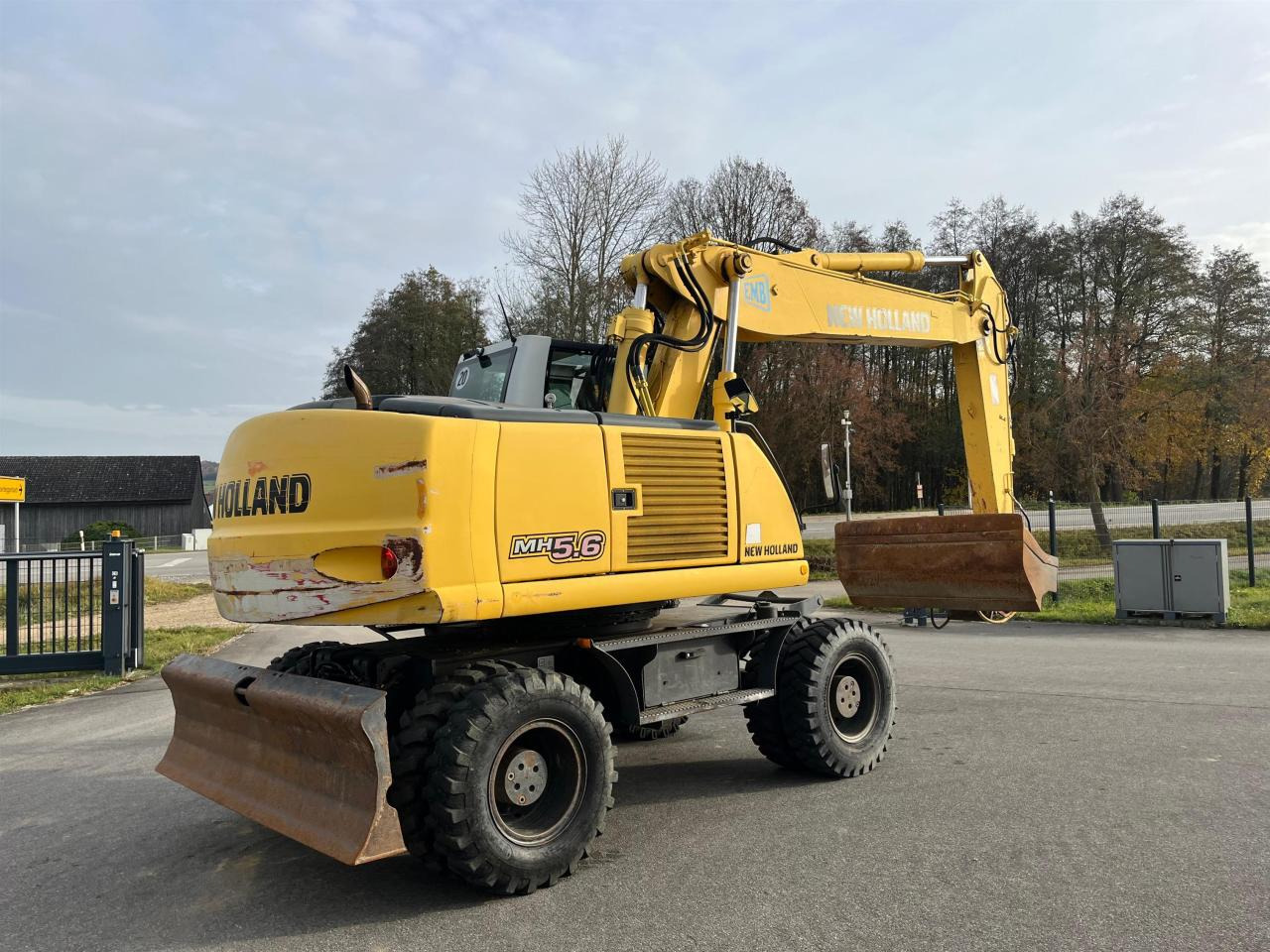 New Holland MH 5.6 inkl. Grabenlöffel, Tieflöffel - Ratastel ekskavaator: pilt 5 New Holland MH 5.6 inkl. Grabenlöffel, Tieflöffel - Ratastel ekskavaator: pilt 5