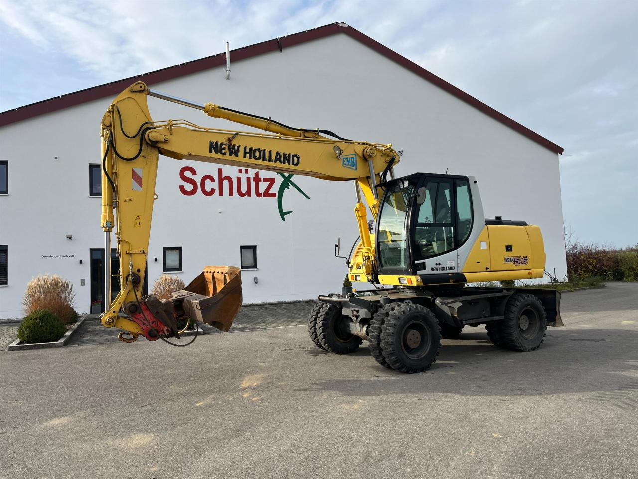 New Holland MH 5.6 inkl. Grabenlöffel, Tieflöffel - Ratastel ekskavaator: pilt 2 New Holland MH 5.6 inkl. Grabenlöffel, Tieflöffel - Ratastel ekskavaator: pilt 2