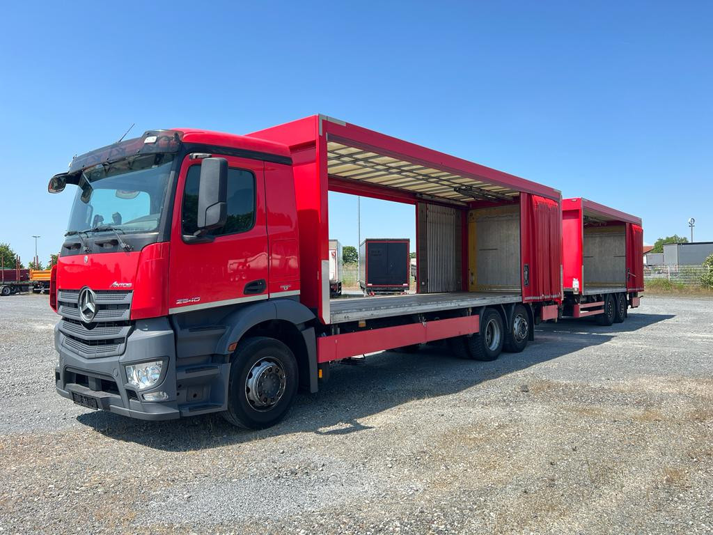 MERCEDES-BENZ Antos 2540 L 6x2 Pritsche LBW Coca Cola LBW 2to - Tent veoauto: pilt 1 MERCEDES-BENZ Antos 2540 L 6x2 Pritsche LBW Coca Cola LBW 2to - Tent veoauto: pilt 1