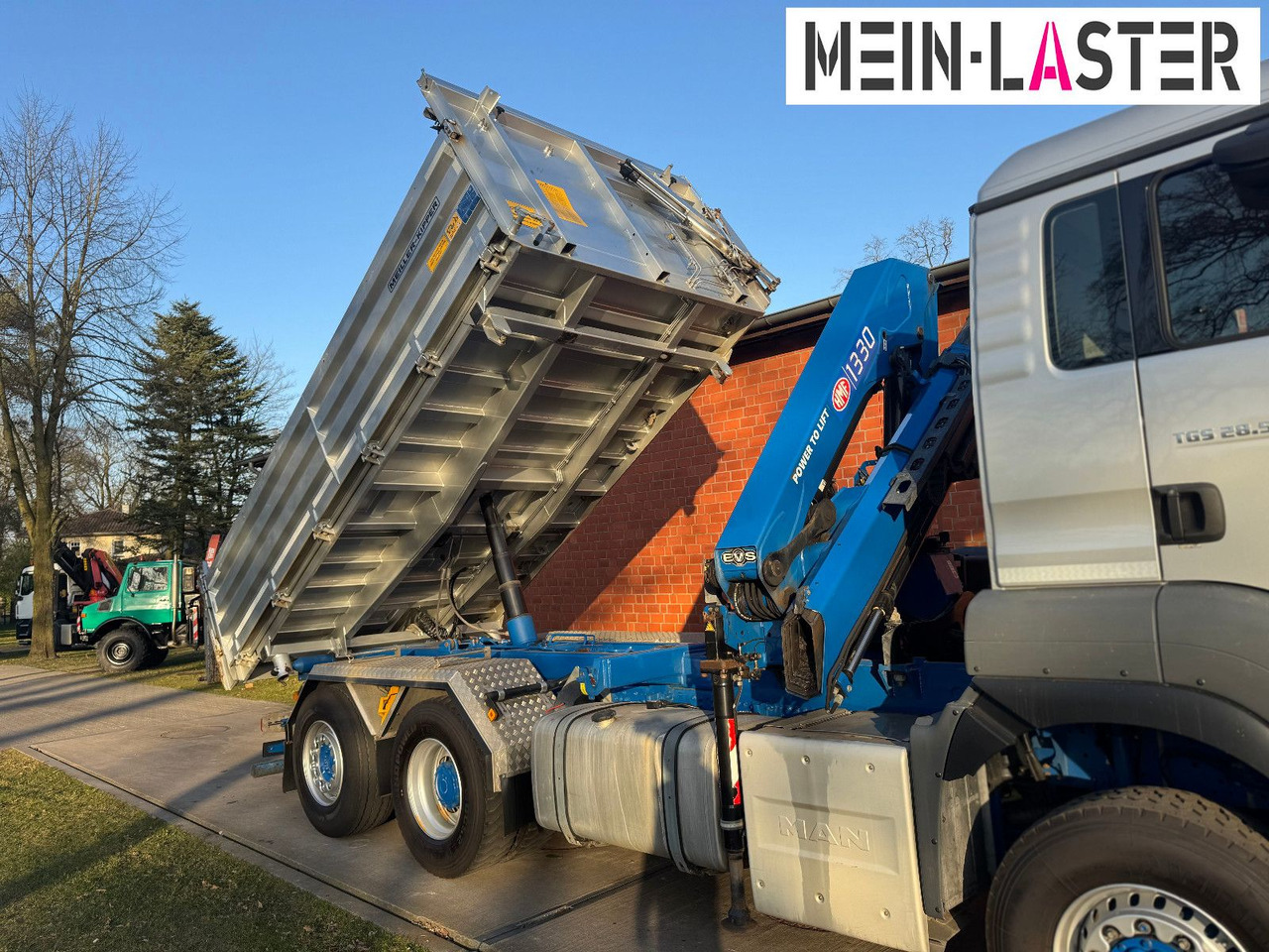 MAN Aufbau Meiller Bordmatik + HMF 1330 K4 15m Funk - Kallurauto, Kraanaga veoauto: pilt 2 MAN Aufbau Meiller Bordmatik + HMF 1330 K4 15m Funk - Kallurauto, Kraanaga veoauto: pilt 2