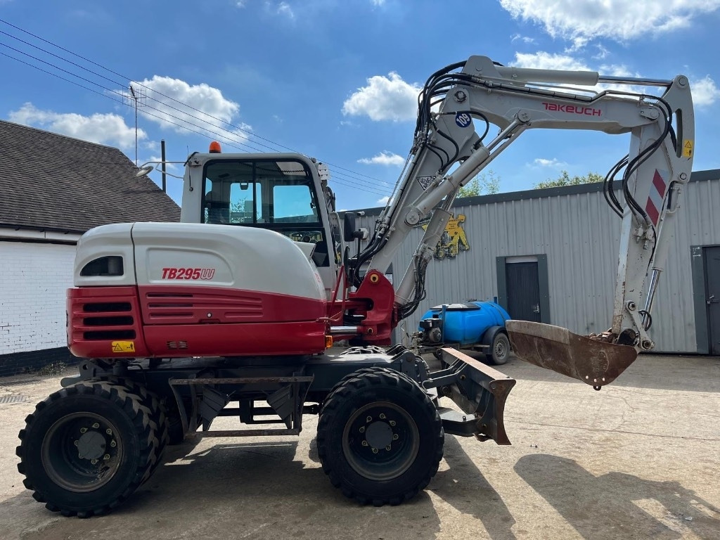 Takeuchi TB295W - Ratastel ekskavaator: pilt 1 Takeuchi TB295W - Ratastel ekskavaator: pilt 1