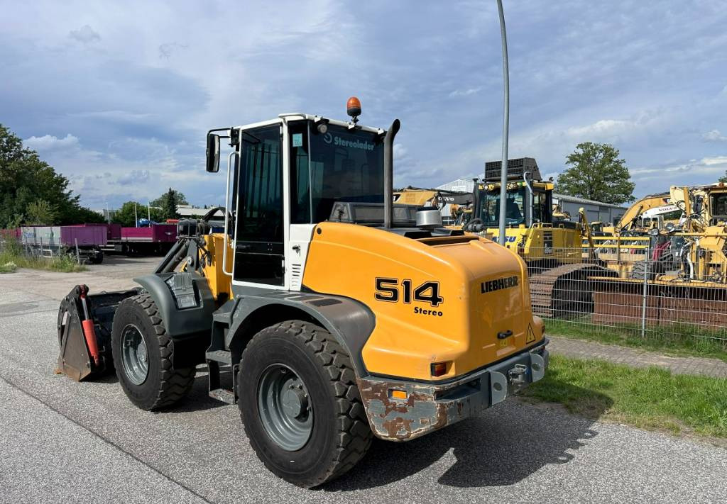Liebherr L 514 Stereo +30 Kmh Klima 3er Kreis Greifschaufel - Rataslaadur: pilt 5 Liebherr L 514 Stereo +30 Kmh Klima 3er Kreis Greifschaufel - Rataslaadur: pilt 5