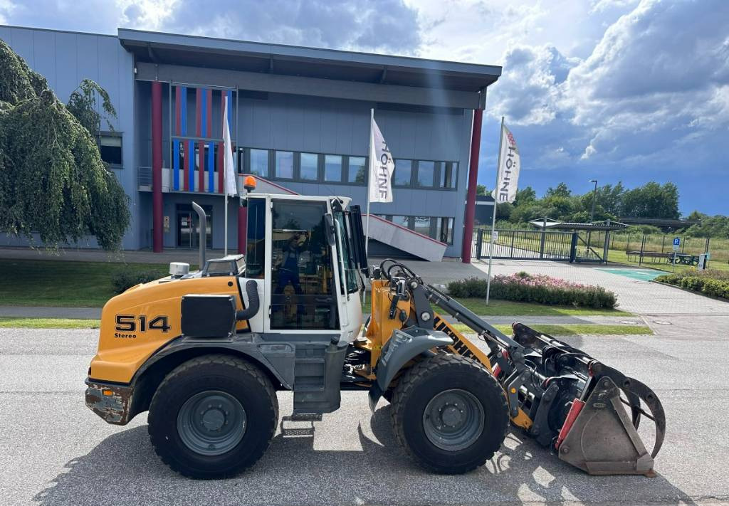 Liebherr L 514 Stereo +30 Kmh Klima 3er Kreis Greifschaufel - Rataslaadur: pilt 2 Liebherr L 514 Stereo +30 Kmh Klima 3er Kreis Greifschaufel - Rataslaadur: pilt 2