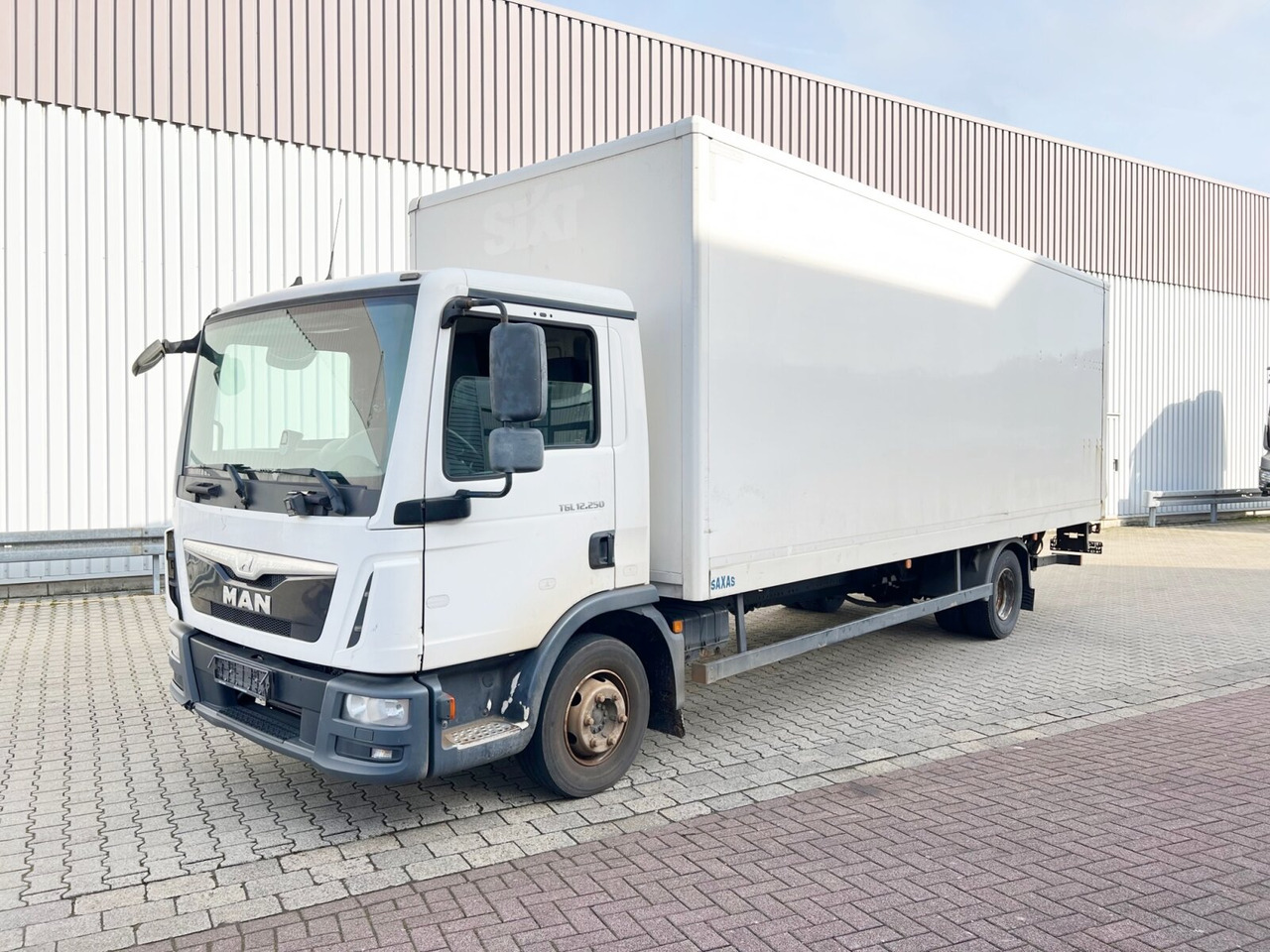MAN TGL 12.250/340 4X2 BL TGL 12.250/340 4X2 BL mit Dhollandia LBW, 42 cbm - Kasti veoauto: pilt 1 MAN TGL 12.250/340 4X2 BL TGL 12.250/340 4X2 BL mit Dhollandia LBW, 42 cbm - Kasti veoauto: pilt 1