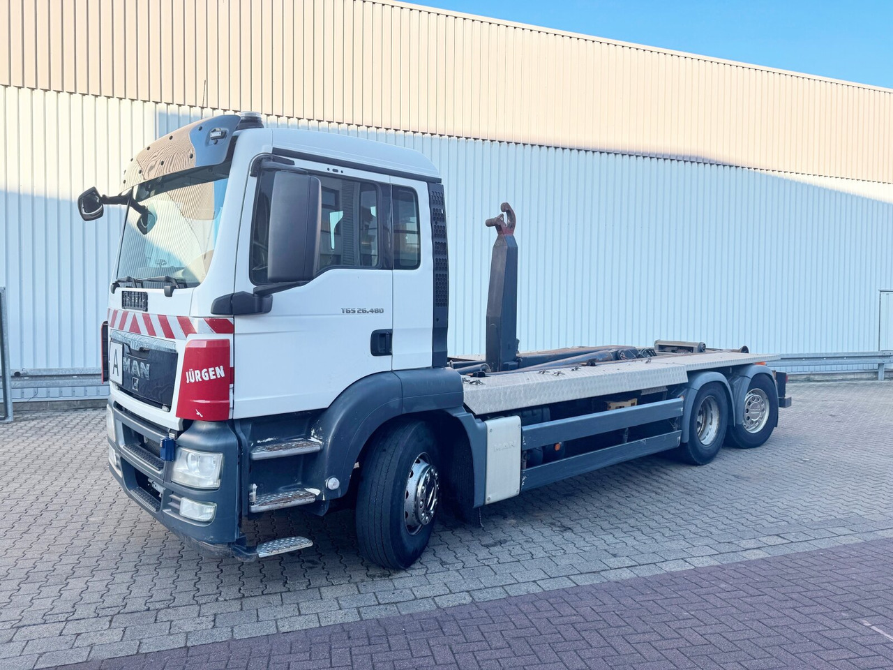 MAN TGS 26.480 6x2-4 BL TGS 26.480 6x2-4 BL, Lenk-Liftachse, VDL Abrollkipper bis 7m Container - Konkstõstukiga veoauto: pilt 1 MAN TGS 26.480 6x2-4 BL TGS 26.480 6x2-4 BL, Lenk-Liftachse, VDL Abrollkipper bis 7m Container - Konkstõstukiga veoauto: pilt 1