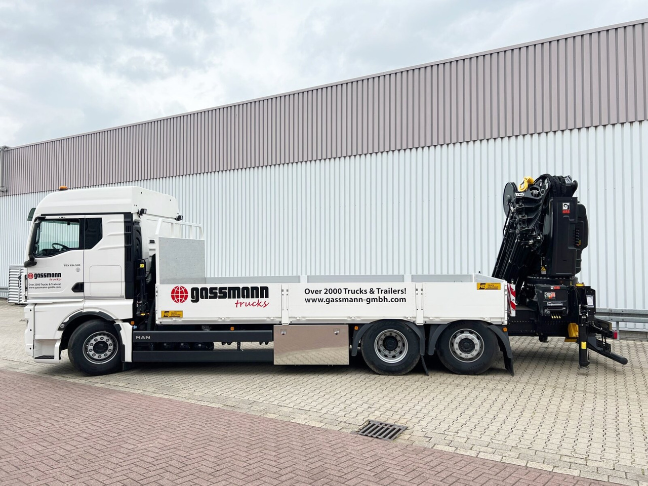 MAN TGX 26.510 6x2-4 LL CH TGX 26.510 6x2-4 LL, Kran Hiab X-HiPro 548 E-8, Lenk-/Liftachse, TwistLock 20Fuß, Funk, Retarder - Kraanaga veoauto, Madelveok/ Platvormveok: pilt 2 MAN TGX 26.510 6x2-4 LL CH TGX 26.510 6x2-4 LL, Kran Hiab X-HiPro 548 E-8, Lenk-/Liftachse, TwistLock 20Fuß, Funk, Retarder - Kraanaga veoauto, Madelveok/ Platvormveok: pilt 2