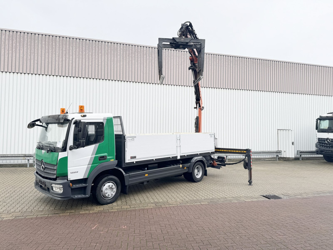 Mercedes-Benz Atego 1223 L 4x2 Atego 1223 L 4x2 mit Heckkran Atlas 88.3-A2L, Funk - Kraanaga veoauto, Madelveok/ Platvormveok: pilt 1 Mercedes-Benz Atego 1223 L 4x2 Atego 1223 L 4x2 mit Heckkran Atlas 88.3-A2L, Funk - Kraanaga veoauto, Madelveok/ Platvormveok: pilt 1