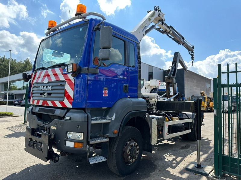 MAN TGA 18.310 4x4 HOOKLIFT + CRANE PALFINGER PK12000 - RADIO - ROTATOR - STEEL SPRING / HUB REDUCTION - MANUAL ZF - BE TRUCK - Konkstõstukiga veoauto, Kraanaga veoauto: pilt 3 MAN TGA 18.310 4x4 HOOKLIFT + CRANE PALFINGER PK12000 - RADIO - ROTATOR - STEEL SPRING / HUB REDUCTION - MANUAL ZF - BE TRUCK - Konkstõstukiga veoauto, Kraanaga veoauto: pilt 3