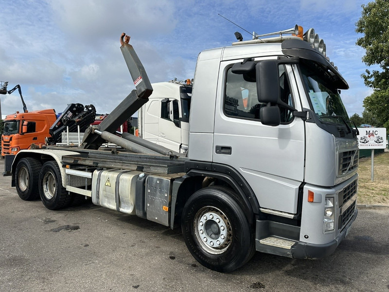 Volvo FM 400 6x4 HOOKLIFT / HAAKARM WAF 20T - EURO 5 - MANUAL - BLADVERING / STEEL SUSPENSION - TÜV 02/2026 - BE TRUCK - Konkstõstukiga veoauto: pilt 1 Volvo FM 400 6x4 HOOKLIFT / HAAKARM WAF 20T - EURO 5 - MANUAL - BLADVERING / STEEL SUSPENSION - TÜV 02/2026 - BE TRUCK - Konkstõstukiga veoauto: pilt 1
