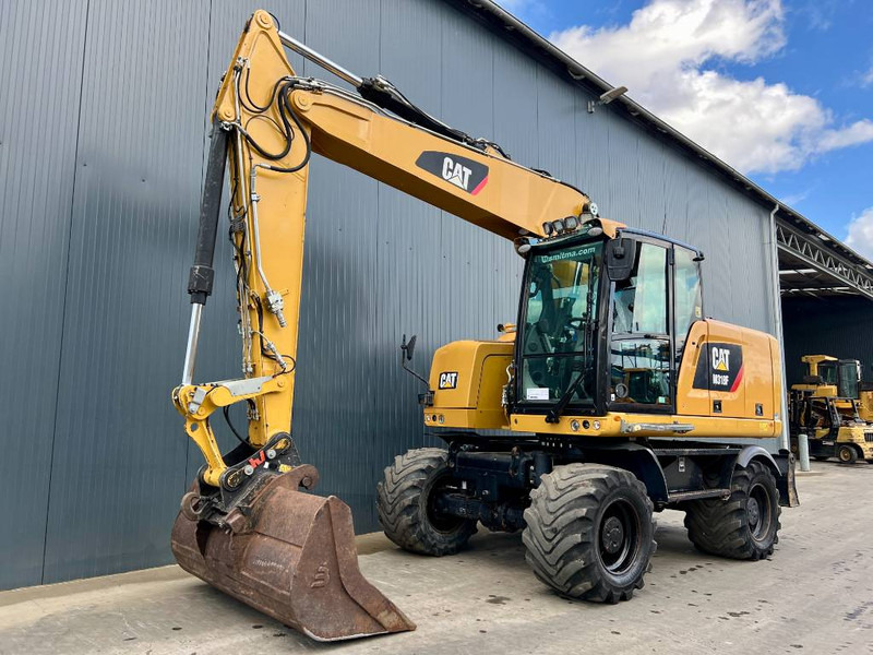 Cat M318F - Ratastel ekskavaator: pilt 1 Cat M318F - Ratastel ekskavaator: pilt 1