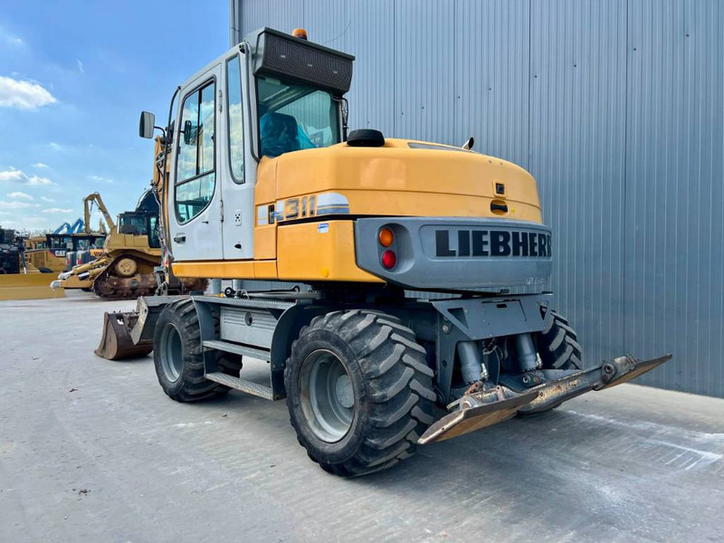 Liebherr A311 Litronic - Ratastel ekskavaator: pilt 2 Liebherr A311 Litronic - Ratastel ekskavaator: pilt 2
