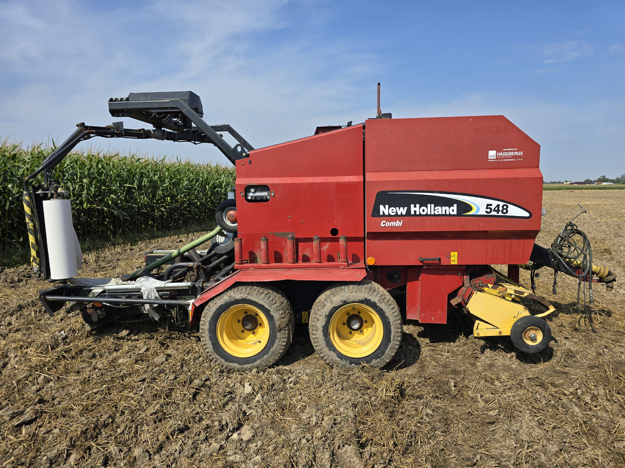 NEW HOLLAND 548 Combi - Heinapress, ümmargune: pilt 2 NEW HOLLAND 548 Combi - Heinapress, ümmargune: pilt 2