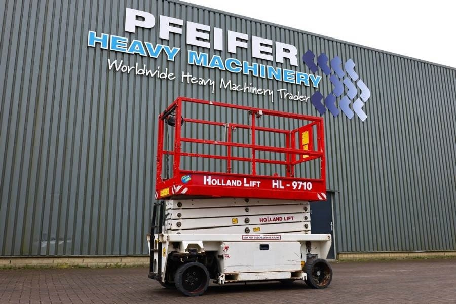 Holland Lift Ecostar HL-9710 Electric, 12m Working Height, 325k - Käärlift: pilt 1 Holland Lift Ecostar HL-9710 Electric, 12m Working Height, 325k - Käärlift: pilt 1
