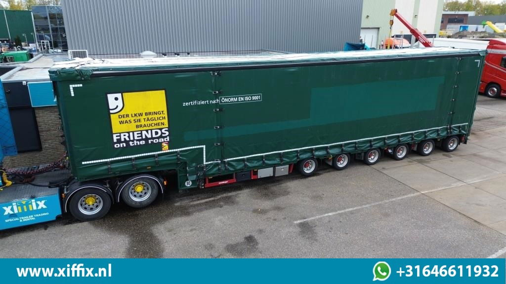 Meusburger 6-ass. Semi dieplader met elektische huifopbouw / 3x naloop gestuurd - Madal platvormpoolhaagis: pilt 1 Meusburger 6-ass. Semi dieplader met elektische huifopbouw / 3x naloop gestuurd - Madal platvormpoolhaagis: pilt 1