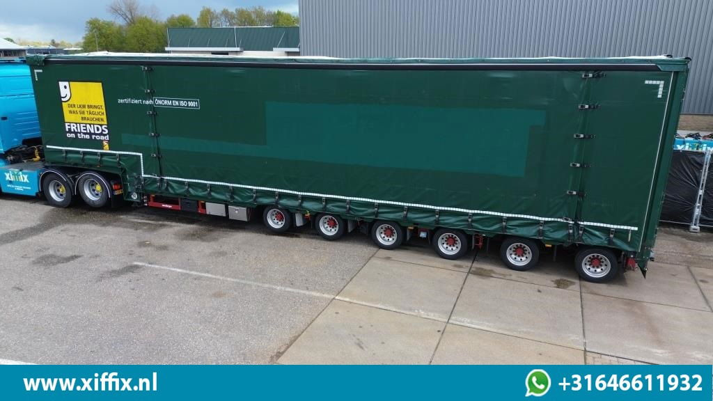 Meusburger 6-ass. Semi dieplader met elektische huifopbouw / 3x naloop gestuurd - Madal platvormpoolhaagis: pilt 2 Meusburger 6-ass. Semi dieplader met elektische huifopbouw / 3x naloop gestuurd - Madal platvormpoolhaagis: pilt 2