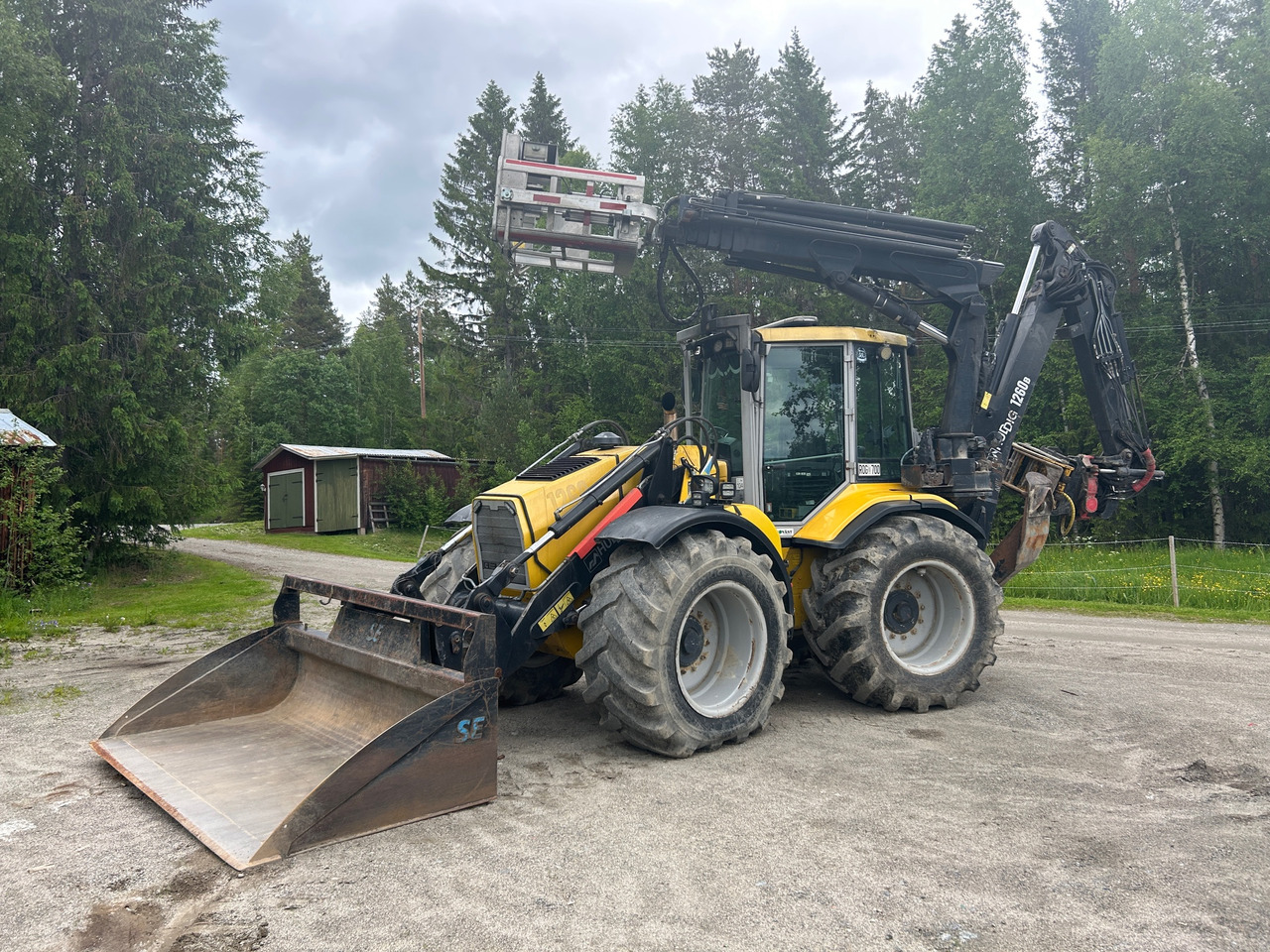 Huddig 1260B - Ekskavaator-laadur: pilt 1 Huddig 1260B - Ekskavaator-laadur: pilt 1