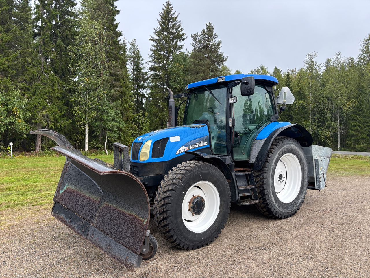 New Holland TS110A - Traktor: pilt 1 New Holland TS110A - Traktor: pilt 1