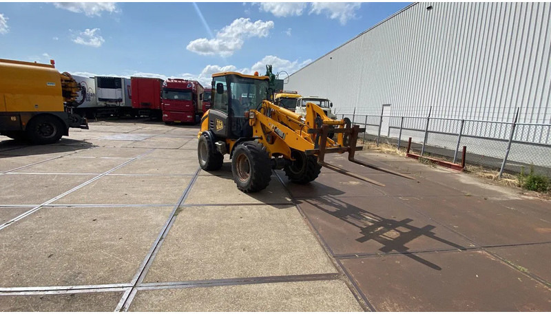 JCB KNIKSCHOVEL 406 - Rataslaadur: pilt 1 JCB KNIKSCHOVEL 406 - Rataslaadur: pilt 1