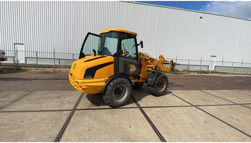 JCB KNIKSCHOVEL 406 - Rataslaadur: pilt 4 JCB KNIKSCHOVEL 406 - Rataslaadur: pilt 4