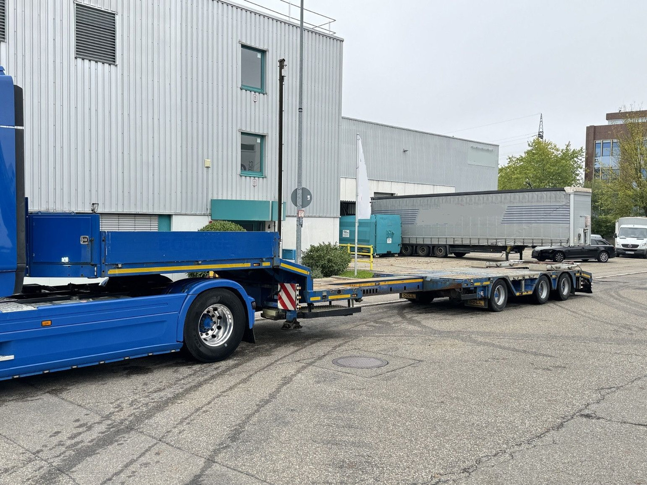 Doll S3L Tele-Tieflader+3,3m Radmulden Lift Lenkachse - Madal platvormpoolhaagis: pilt 1 Doll S3L Tele-Tieflader+3,3m Radmulden Lift Lenkachse - Madal platvormpoolhaagis: pilt 1