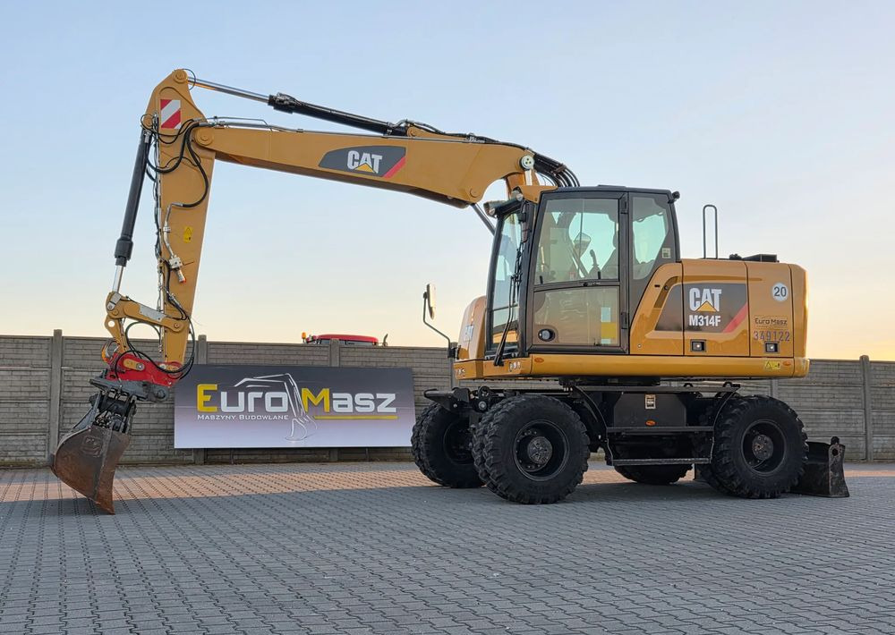 Caterpillar M314F, 2018 ROK, 4200 MTH, 2 ŁYŻKI - Ratastel ekskavaator: pilt 1 Caterpillar M314F, 2018 ROK, 4200 MTH, 2 ŁYŻKI - Ratastel ekskavaator: pilt 1
