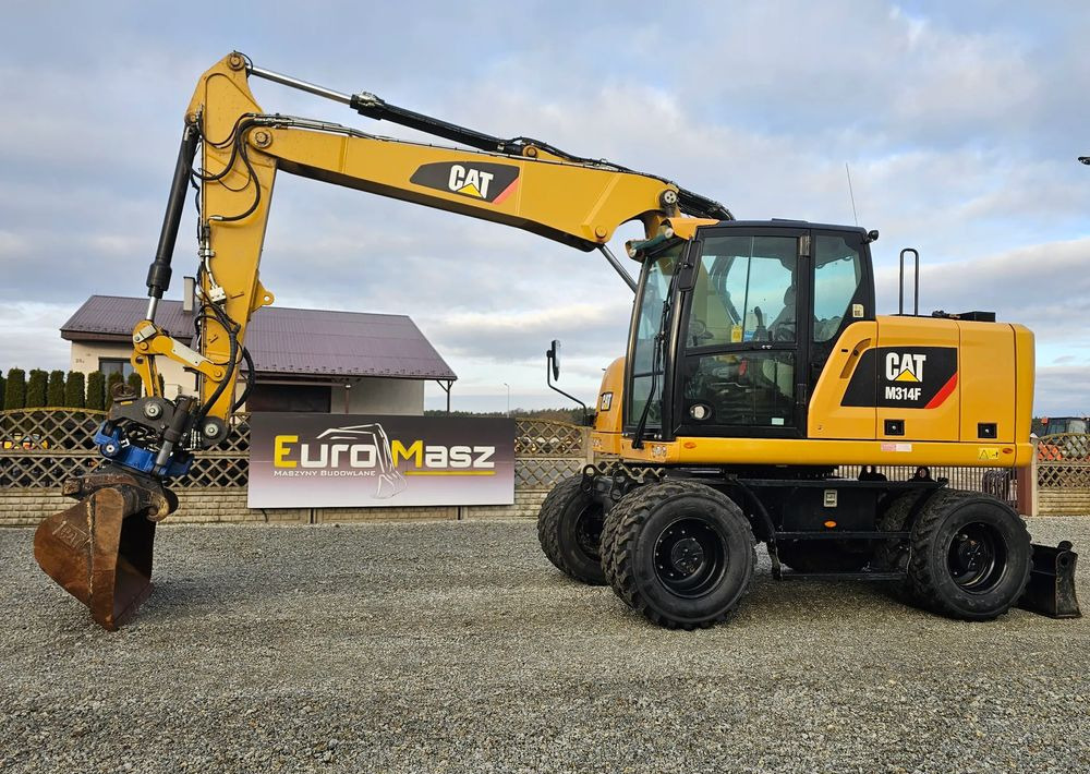 Caterpillar M314F, 2019 ROK, 5600 MTH, GŁOWICA SMP - Ratastel ekskavaator: pilt 1 Caterpillar M314F, 2019 ROK, 5600 MTH, GŁOWICA SMP - Ratastel ekskavaator: pilt 1