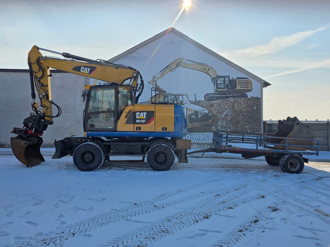 Caterpillar M318F, 2018 ROK, PODPORY + PŁUG, ROTOTILT - Ratastel ekskavaator: pilt 1 Caterpillar M318F, 2018 ROK, PODPORY + PŁUG, ROTOTILT - Ratastel ekskavaator: pilt 1