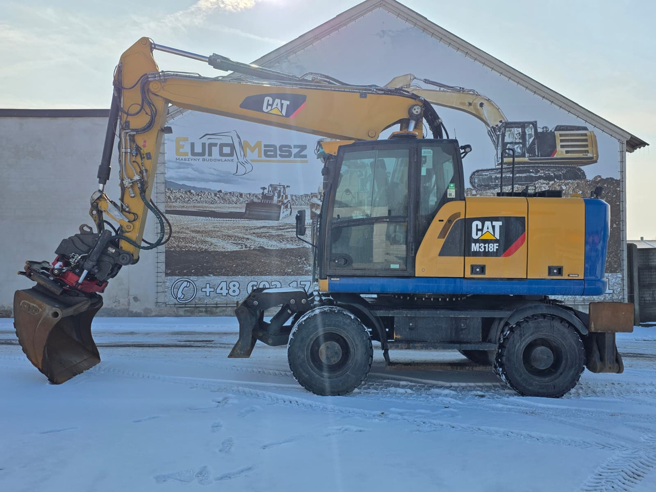 Caterpillar M318F, 2018 ROK, PODPORY + PŁUG, ROTOTILT - Ratastel ekskavaator: pilt 2 Caterpillar M318F, 2018 ROK, PODPORY + PŁUG, ROTOTILT - Ratastel ekskavaator: pilt 2