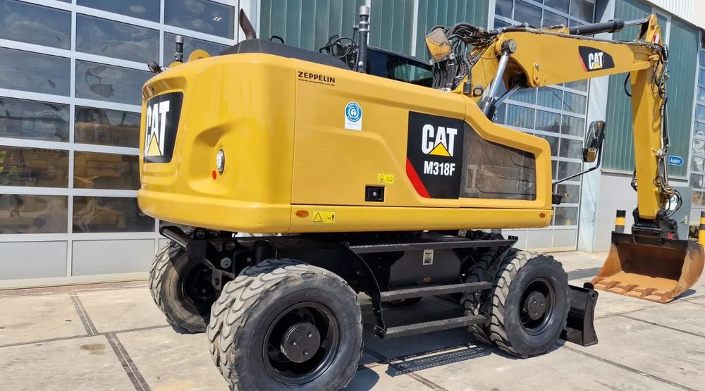 Caterpillar M318F, 2019 ROK, IMPORT NIEMCY - Ratastel ekskavaator: pilt 1 Caterpillar M318F, 2019 ROK, IMPORT NIEMCY - Ratastel ekskavaator: pilt 1