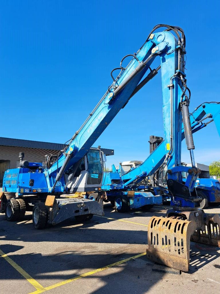 Fuchs MHL331E + Grapple - Jäätme-/ Tööstuslik käitleja: pilt 2 Fuchs MHL331E + Grapple - Jäätme-/ Tööstuslik käitleja: pilt 2