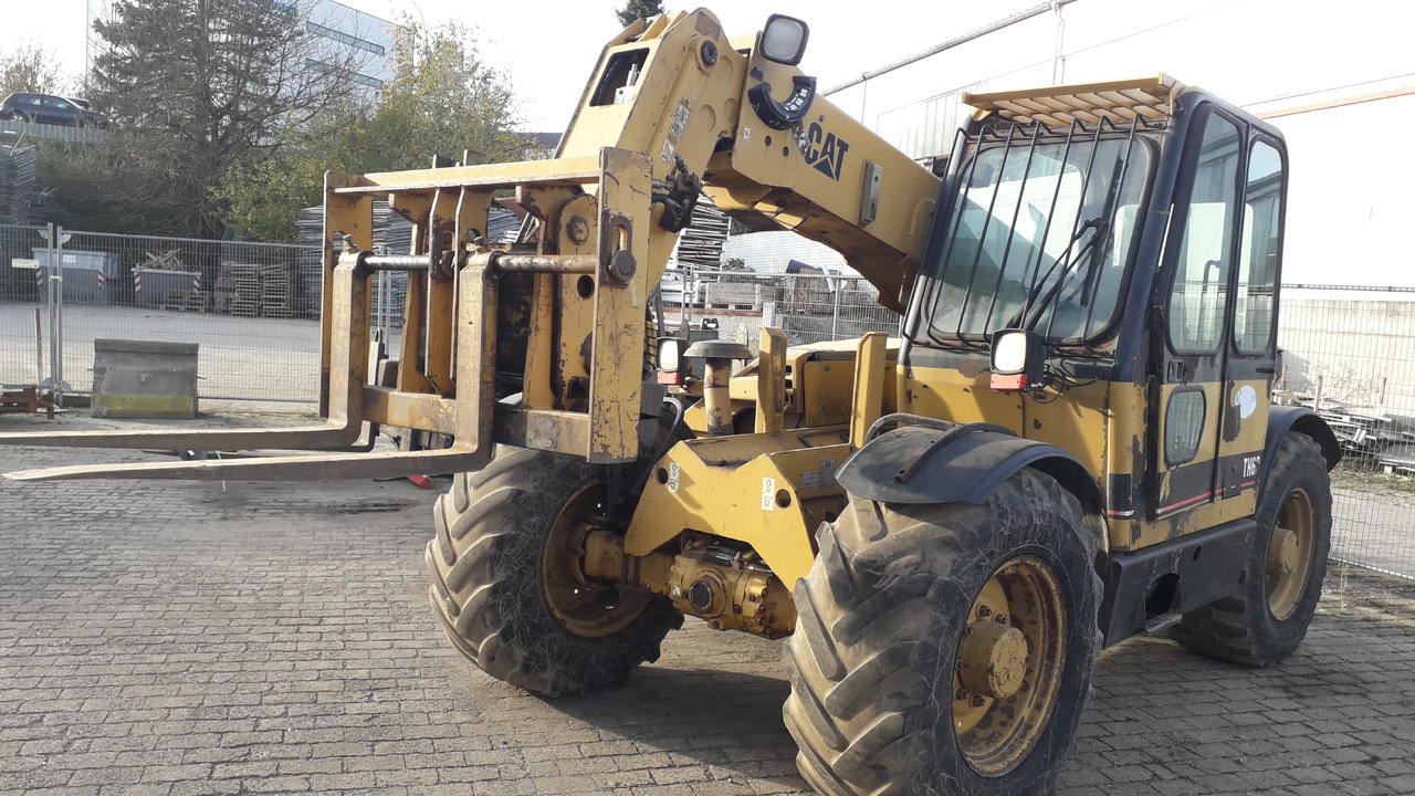 CATERPILLAR TH62 - Rataslaadur: pilt 1 CATERPILLAR TH62 - Rataslaadur: pilt 1