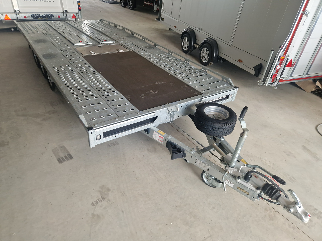 BJT T Transporter 231 500x210cm black Auffahrrampen 235cm Holzboden vorn Tridem 10" 3500kg Aktion - Ehitustehnika haagis: pilt 1 BJT T Transporter 231 500x210cm black Auffahrrampen 235cm Holzboden vorn Tridem 10" 3500kg Aktion - Ehitustehnika haagis: pilt 1