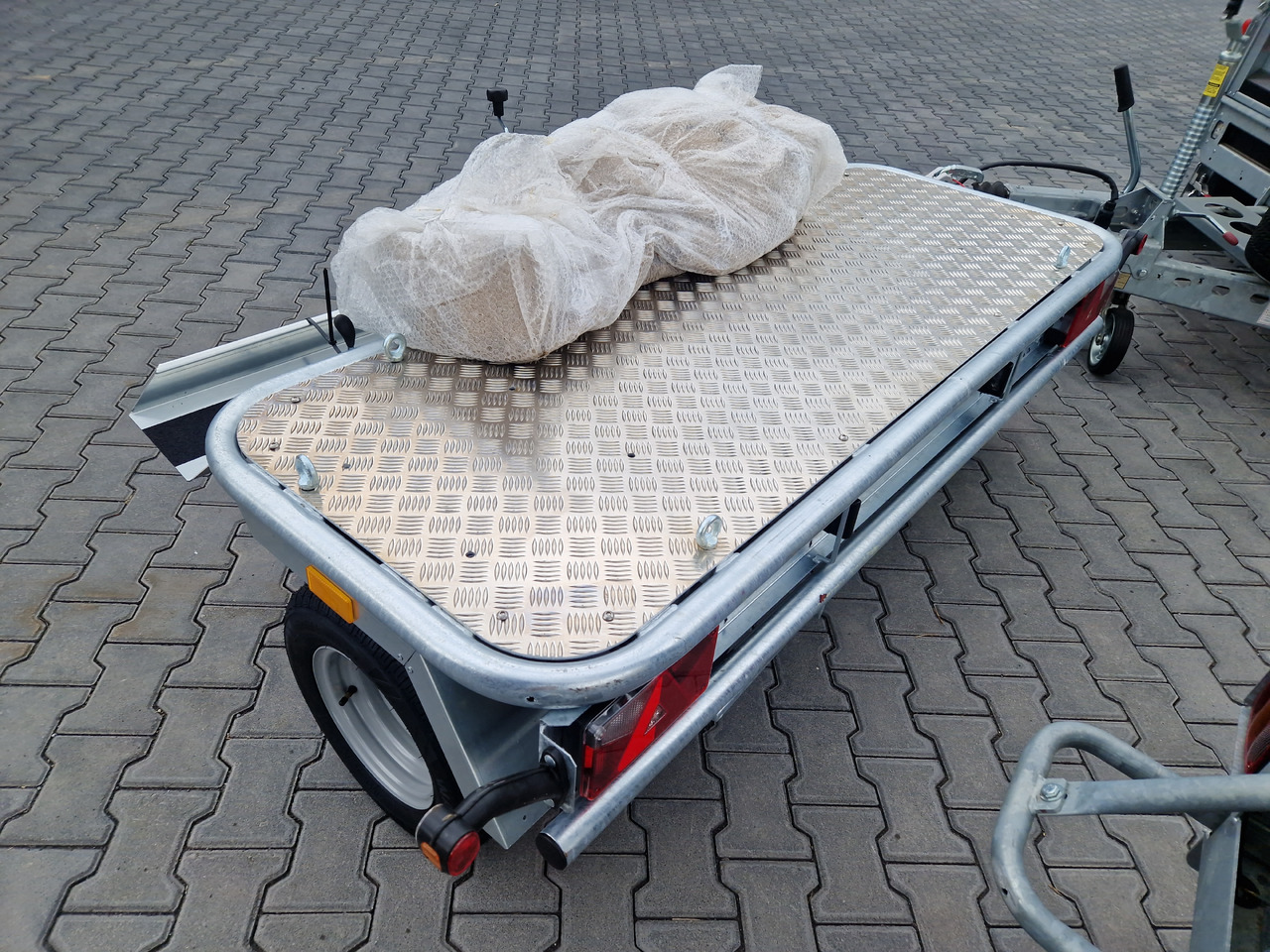 Motorradanhänger Roadster Motocamp 1 quer 200x80cm 750kg 100km/H - Mootorratta haagis: pilt 3 Motorradanhänger Roadster Motocamp 1 quer 200x80cm 750kg 100km/H - Mootorratta haagis: pilt 3