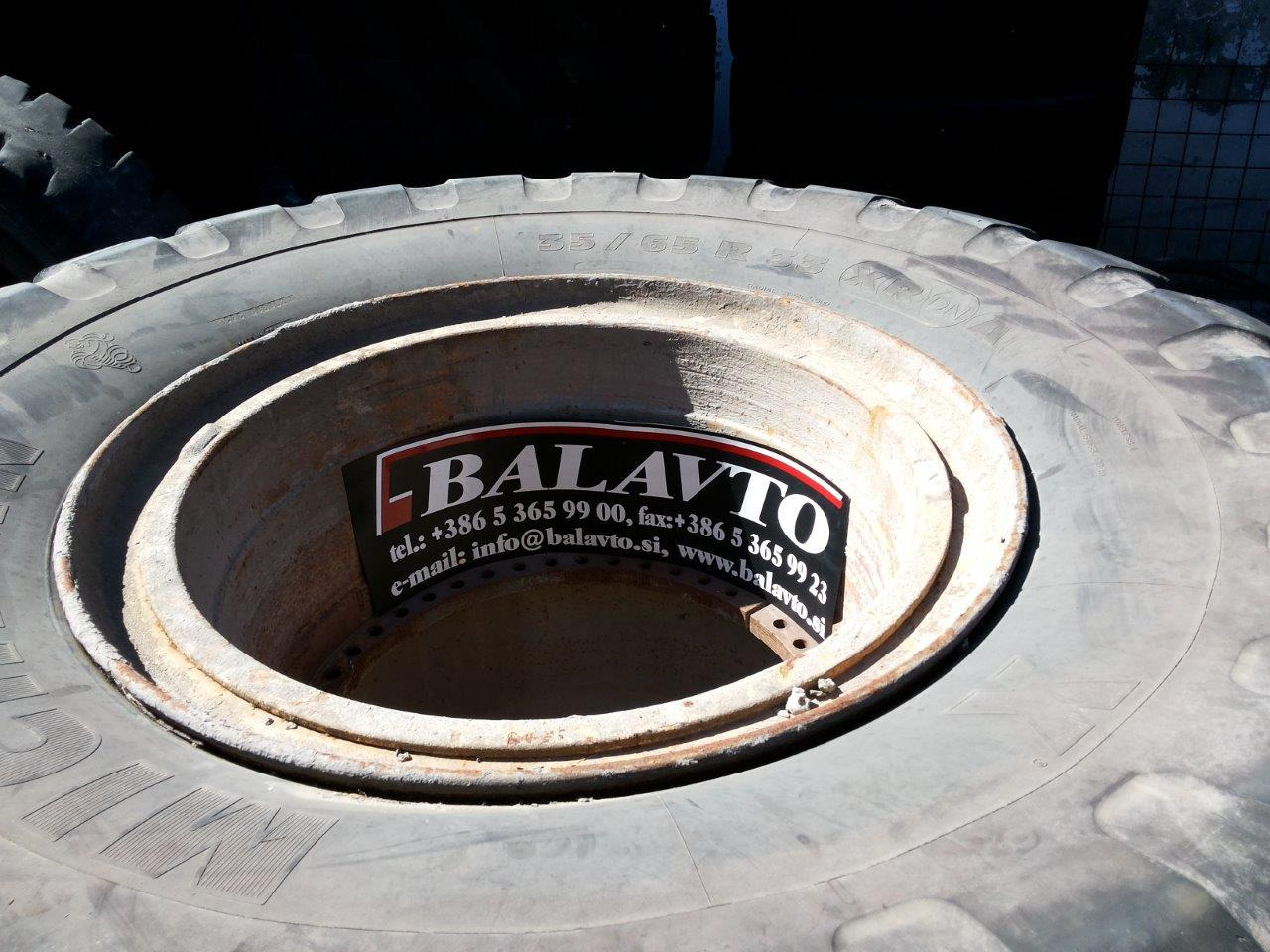 Caterpillar 988B - Komplektne ratas - Ehitusmasinad: pilt 1 Caterpillar 988B - Komplektne ratas - Ehitusmasinad: pilt 1