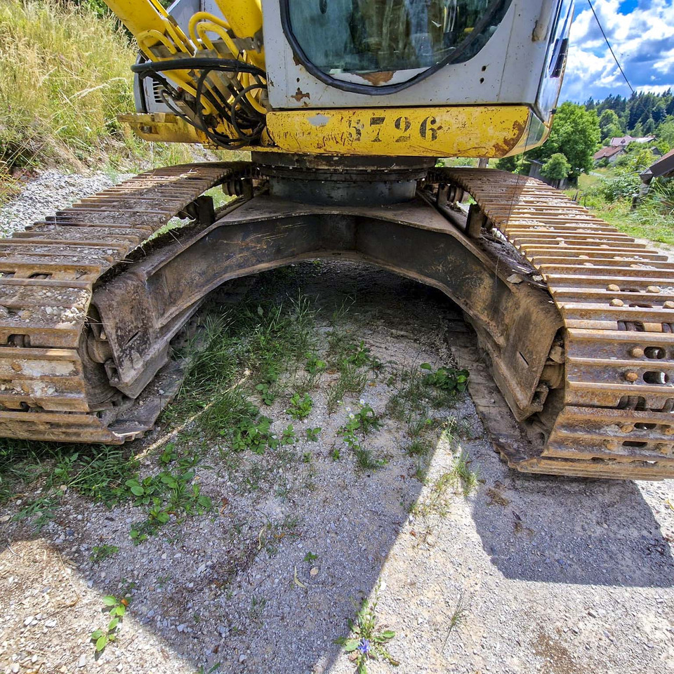 New Holland Kobelco E215 liising New Holland Kobelco E215: pilt 13 New Holland Kobelco E215 liising New Holland Kobelco E215: pilt 13