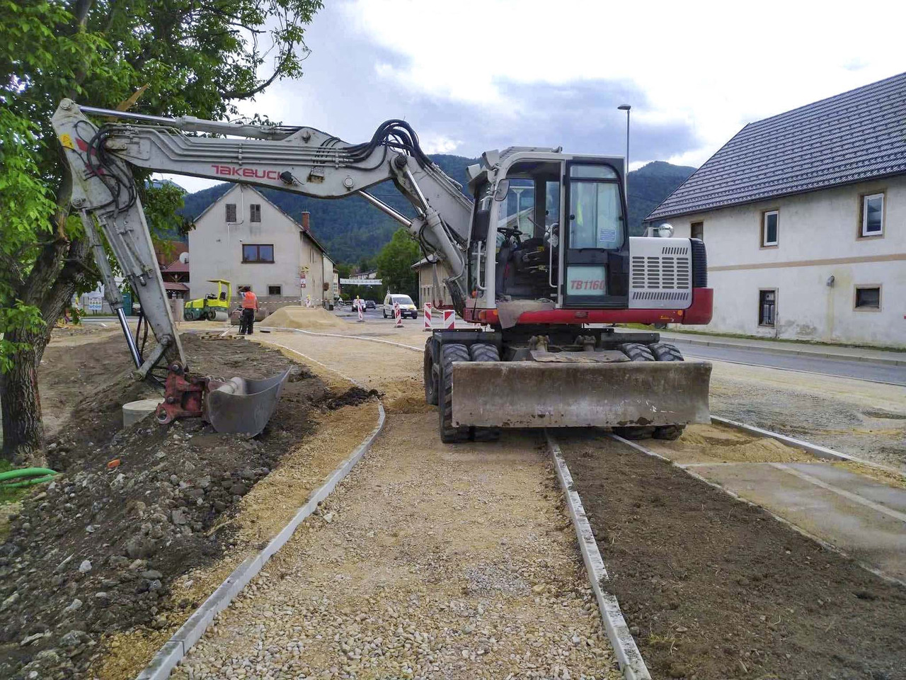 TAKEUCHI TB1160W - Ratastel ekskavaator: pilt 1 TAKEUCHI TB1160W - Ratastel ekskavaator: pilt 1
