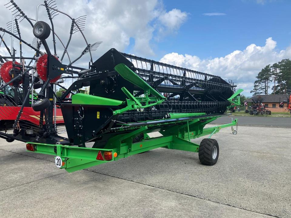 Deutz Fahr Schneidwerk DH540A inkl Schneidwerkwagen Mähdrescher - Kombaini päis: pilt 1 Deutz Fahr Schneidwerk DH540A inkl Schneidwerkwagen Mähdrescher - Kombaini päis: pilt 1