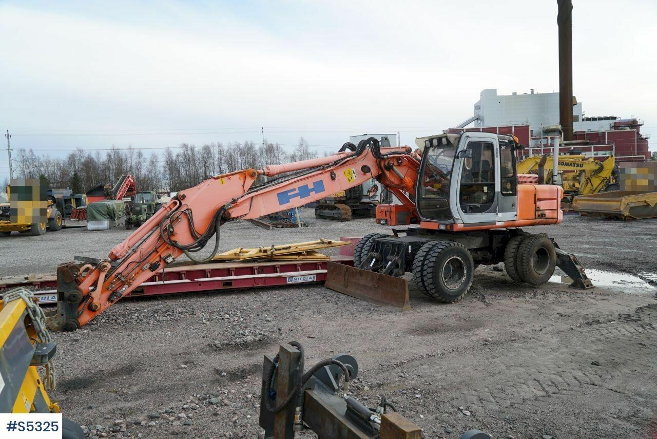 EXCAVATOR Hitachi EX165W with tools - Ekskavaator: pilt 2 EXCAVATOR Hitachi EX165W with tools - Ekskavaator: pilt 2