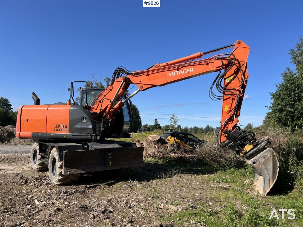 Hitachi ZX140 W-5B with rotor and planer bucket - Ratastel ekskavaator: pilt 1 Hitachi ZX140 W-5B with rotor and planer bucket - Ratastel ekskavaator: pilt 1