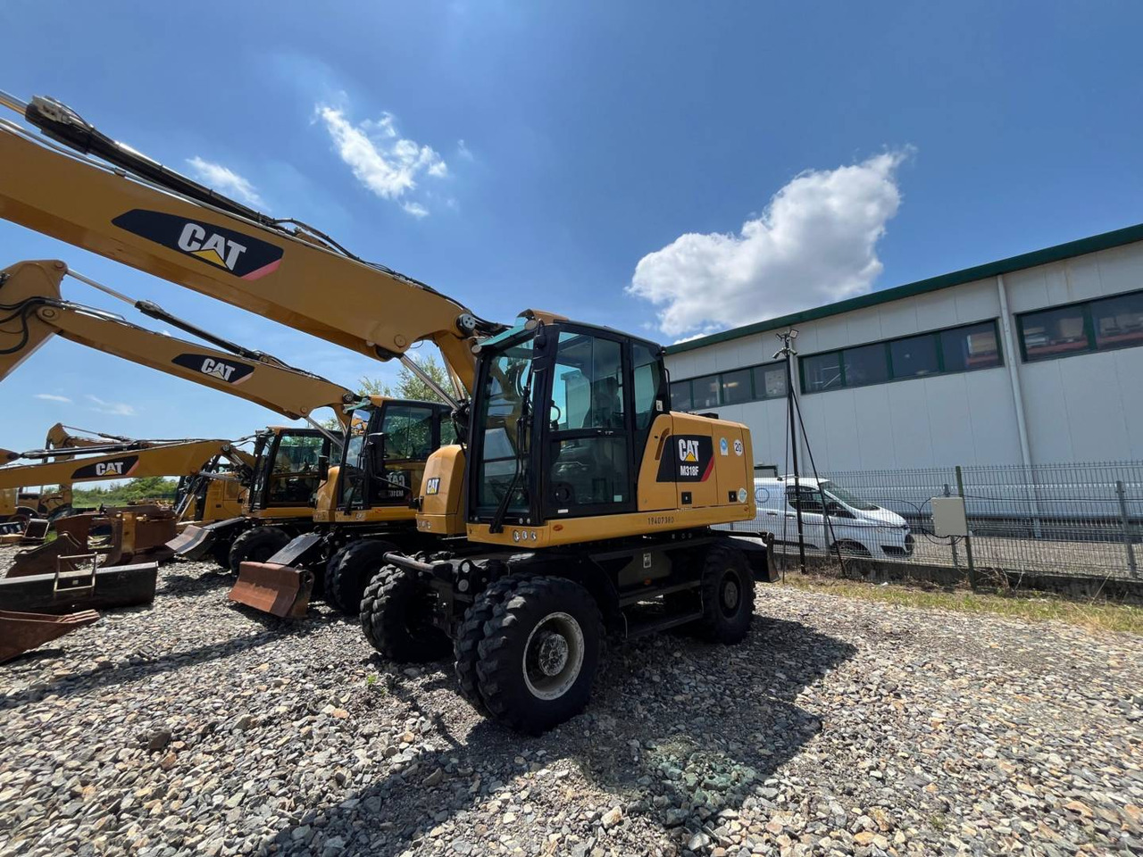 CAT M318F - Ratastel ekskavaator: pilt 1 CAT M318F - Ratastel ekskavaator: pilt 1