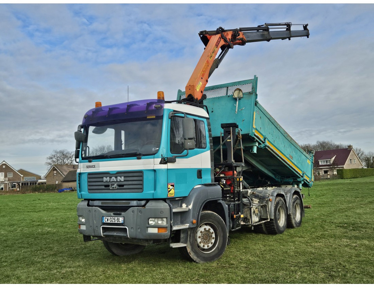 MAN TGA 33.360 TIPPER 3 SIDE CRANE PALFINGER 16502 *REMOTE CONTROL - Kallurauto: pilt 1 MAN TGA 33.360 TIPPER 3 SIDE CRANE PALFINGER 16502 *REMOTE CONTROL - Kallurauto: pilt 1