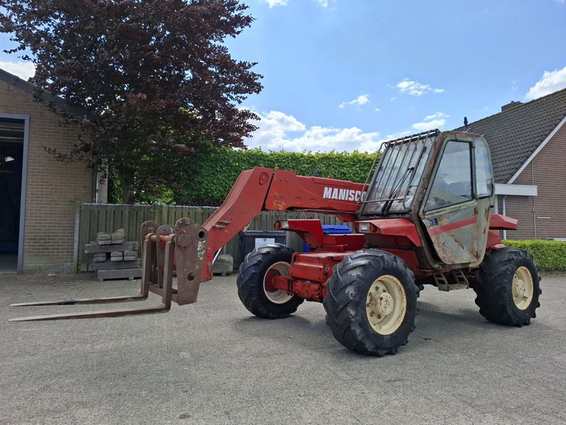 Manitou MT 727 - Teleskooplaadur: pilt 1 Manitou MT 727 - Teleskooplaadur: pilt 1
