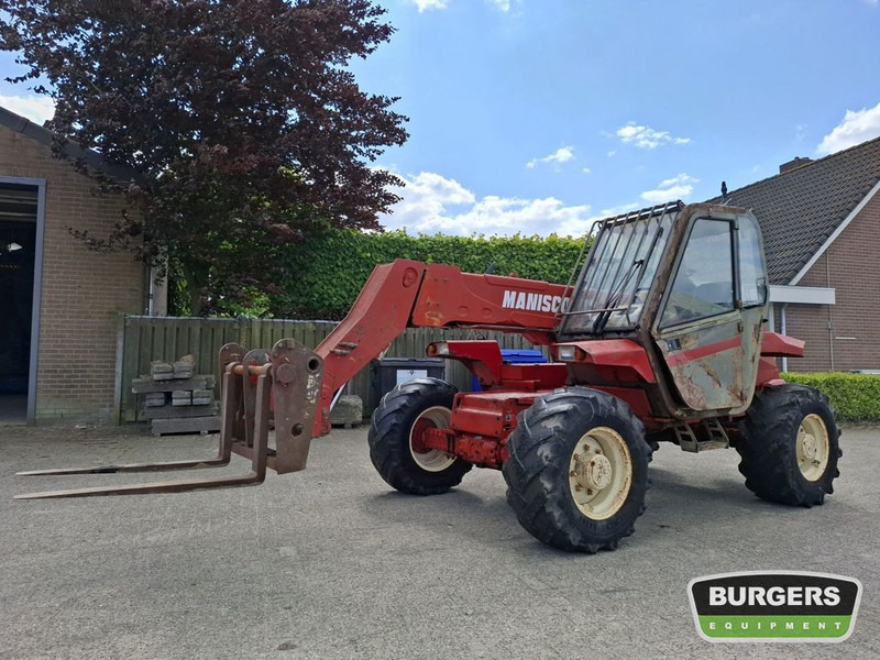 Manitou MT 727 - Teleskooplaadur: pilt 1 Manitou MT 727 - Teleskooplaadur: pilt 1