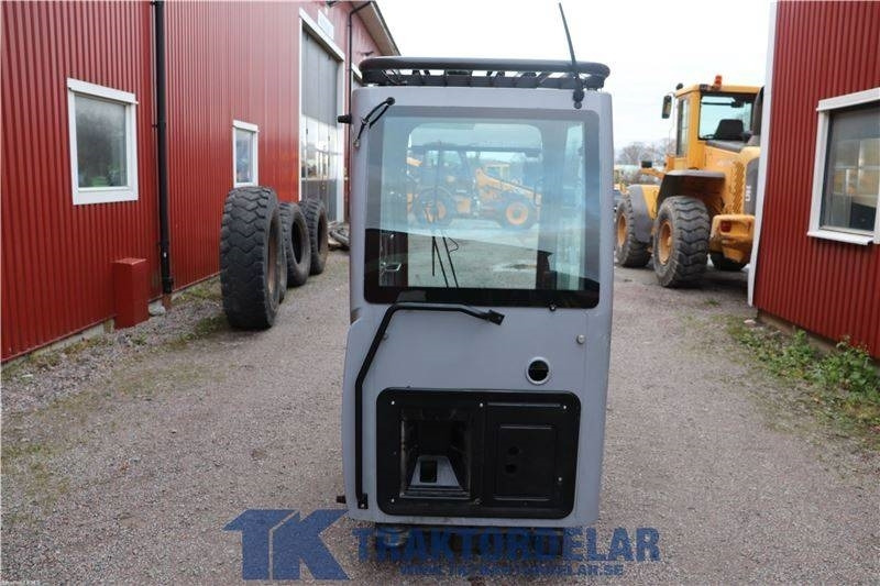 New Holland WE150C - Kabiin - Põllutööseade: pilt 3 New Holland WE150C - Kabiin - Põllutööseade: pilt 3