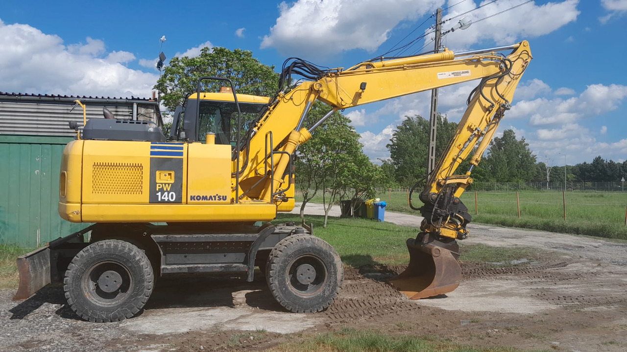 KOMATSU PW 140-7 - Ratastel ekskavaator: pilt 1 KOMATSU PW 140-7 - Ratastel ekskavaator: pilt 1