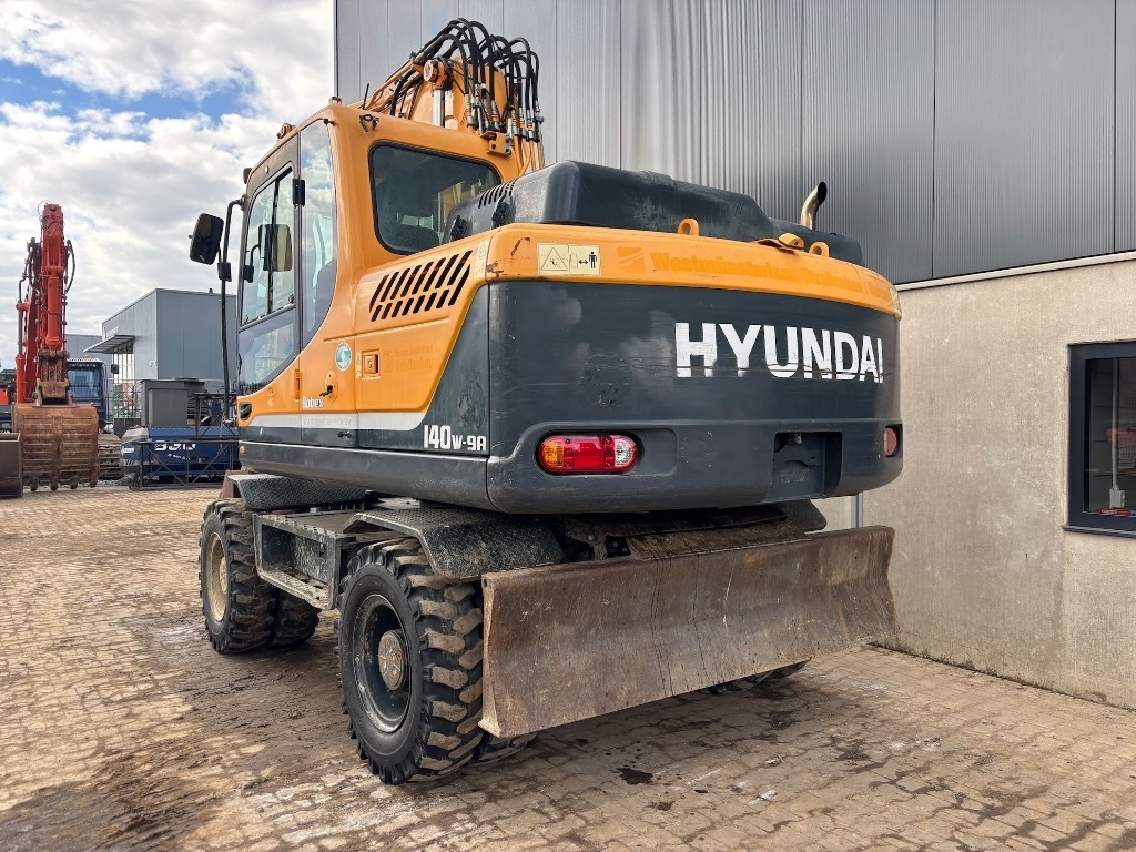 Hyundai Robex 140 W-9 A - R140W-9A - 140W-9 - 140 W-9 - Ratastel ekskavaator: pilt 4 Hyundai Robex 140 W-9 A - R140W-9A - 140W-9 - 140 W-9 - Ratastel ekskavaator: pilt 4