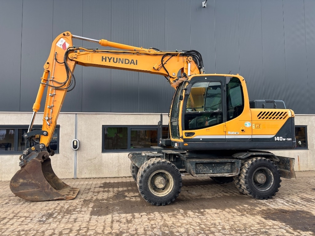Hyundai Robex 140 W-9 A - R140W-9A - 140W-9 - 140 W-9 - Ratastel ekskavaator: pilt 2 Hyundai Robex 140 W-9 A - R140W-9A - 140W-9 - 140 W-9 - Ratastel ekskavaator: pilt 2