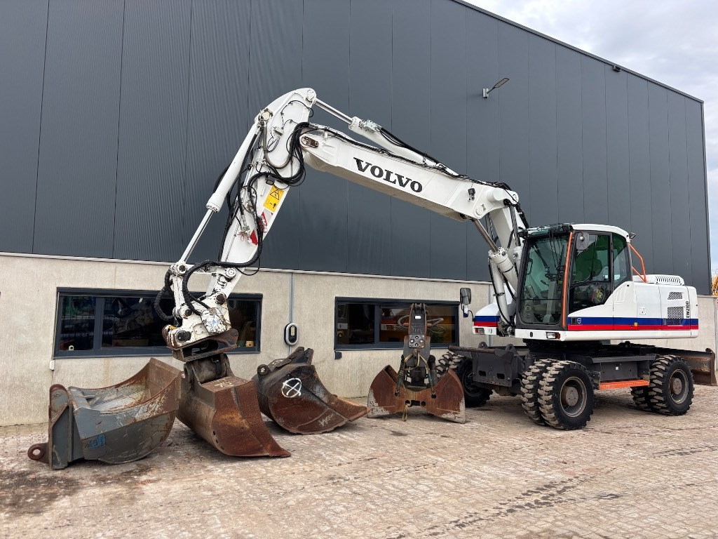 Volvo EW 210 D - EW210 - EW210D - EW 180 - EW 240 - Ratastel ekskavaator: pilt 1 Volvo EW 210 D - EW210 - EW210D - EW 180 - EW 240 - Ratastel ekskavaator: pilt 1